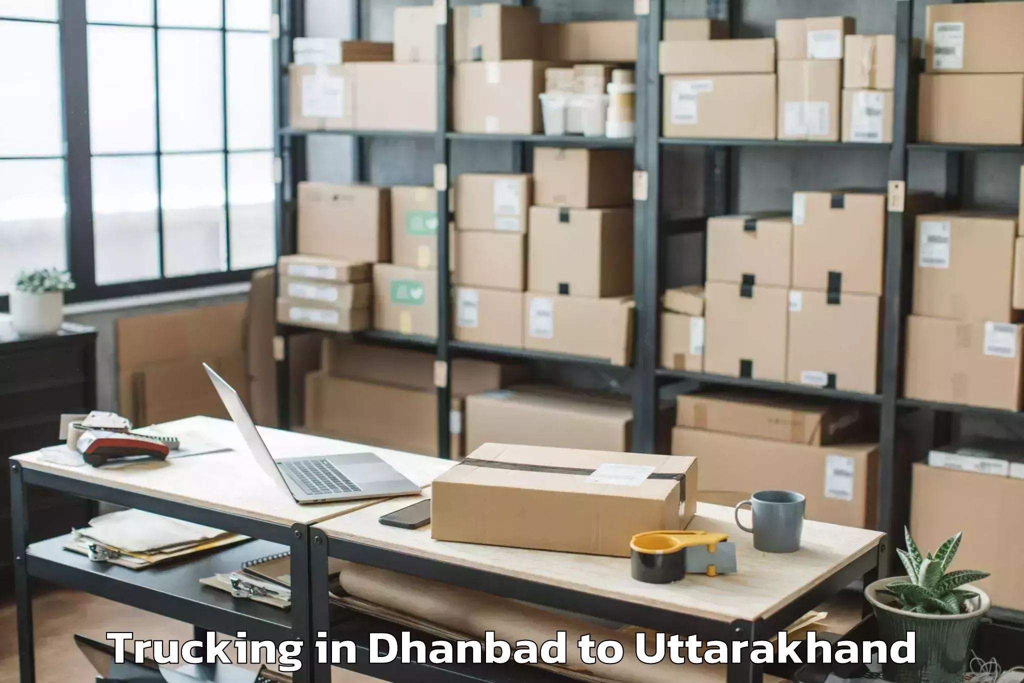 Easy Dhanbad to Banbasa Trucking Booking